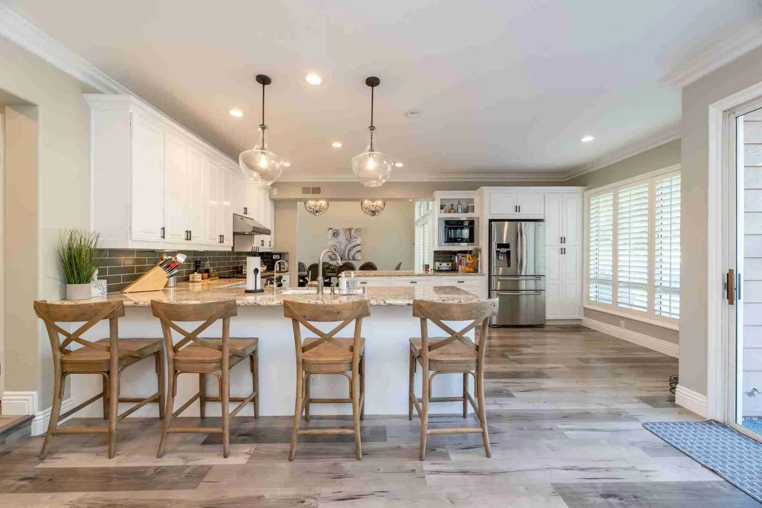 Warm clean kitchen and living space ready after a home cleaning visit